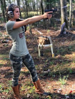 Sophie Swaney shooting with a 9mm Beretta APX. 