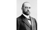 Немецкий предприниматель и промышленник Макс Вильгельм Хайнрих Дутmенхофер, c 1896 года сменивший имя на Макс фон Дуттенхофер, родился 20 мая 1843 г. в городе Роттвайль в Швабии, а  умер 14 августа 1903 г. в Тюбингине